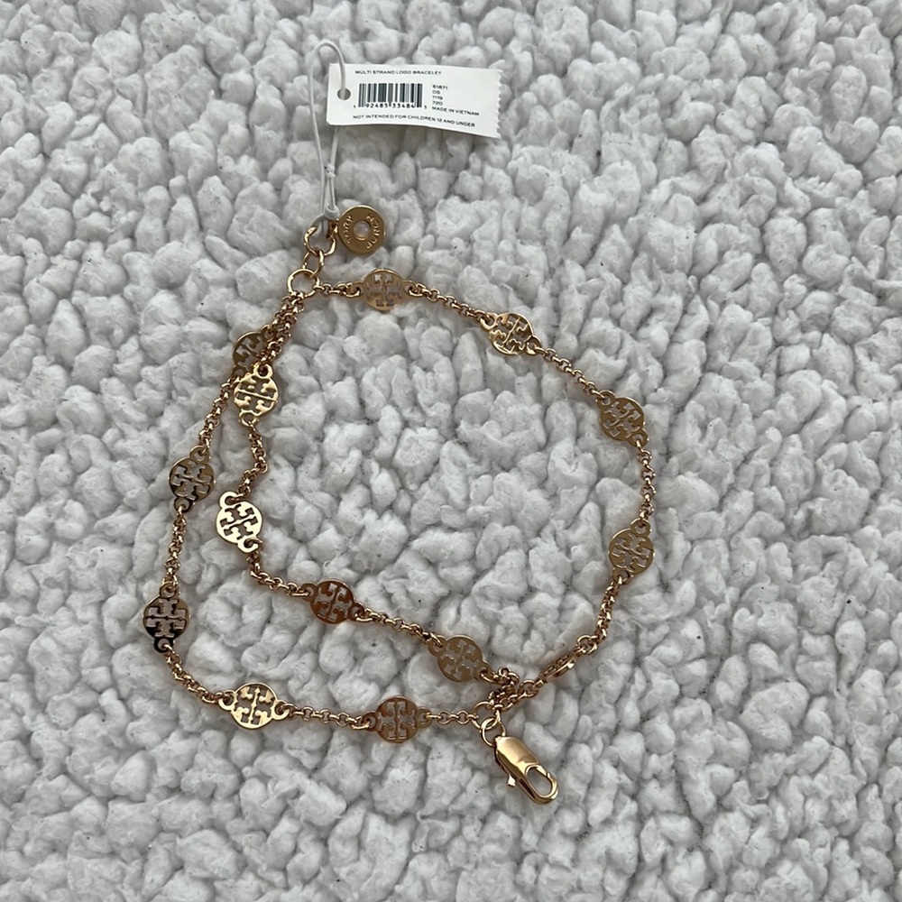 Brand new Tory Burch multi strand logo bracelet